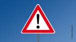 Symbolfoto zeigt das Verkehrszeichen 101 (Gefahrstelle) gemäß Anlage 1 Abschnitt 1 zu § 40 Straßenverkehrsordnung (StVO) als symbolischen Warnhinweis.